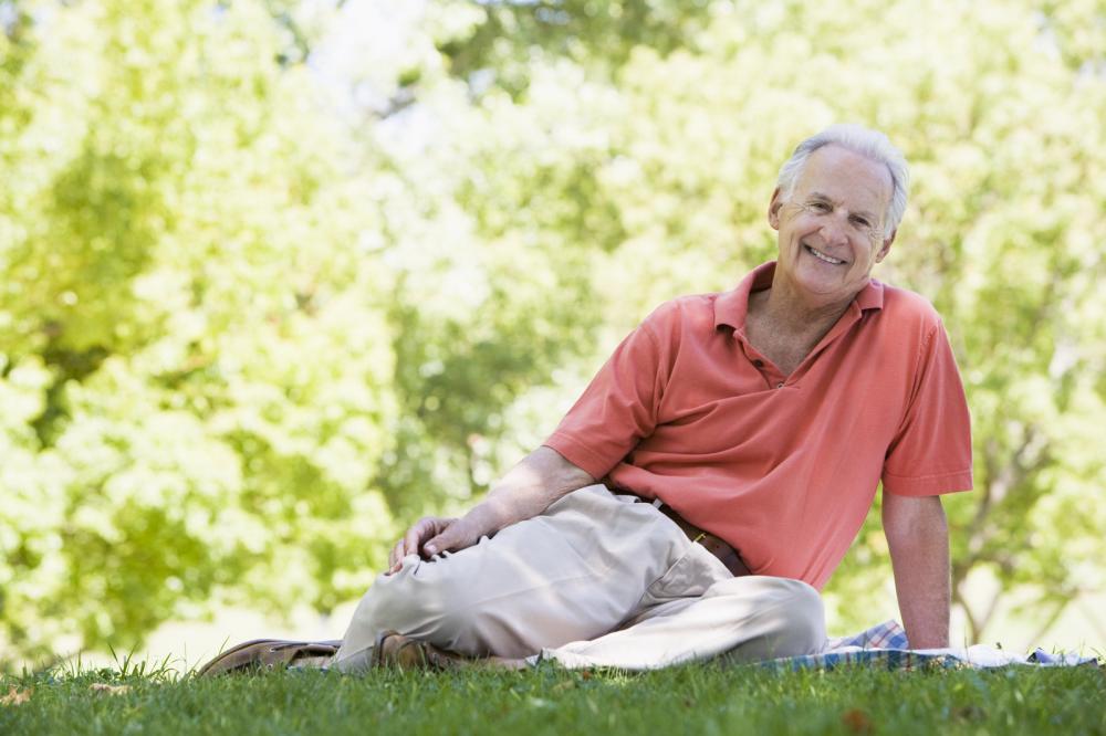 senior-man-sitting-outdoors