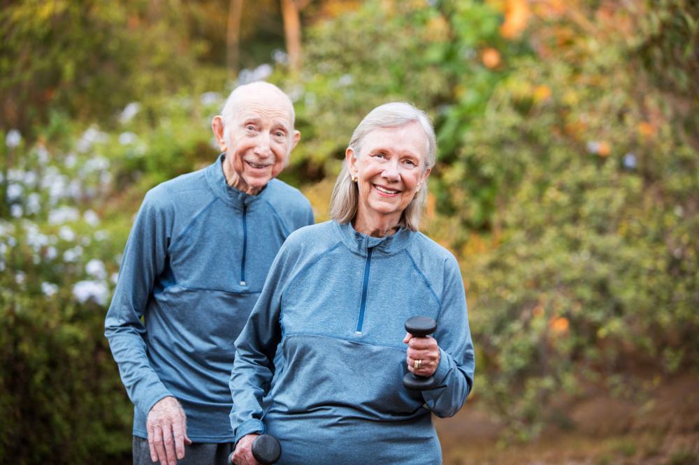 fit-older-couple-standing-in-garden